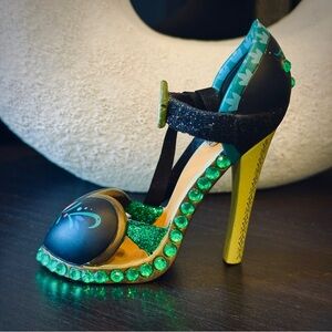 Rare and collectible Disney Parks Frozen Anna glitter heel shoe ornament. NWT